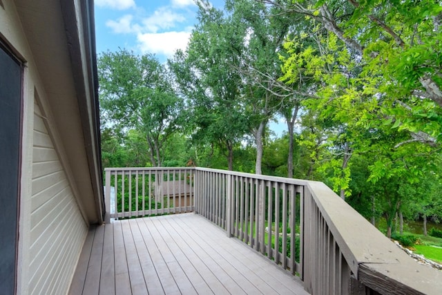 1404 Pearl Cv, Round Rock, TX 78681 - wooden deck with view of wooded area