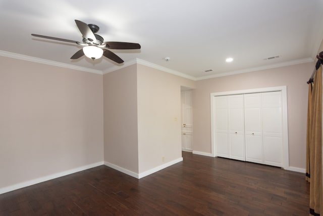 1404 Pearl Cv, Round Rock, TX 78681 - unfurnished bedroom with dark wood finished floors, ornamental molding, a closet, a ceiling fan, and recessed lighting