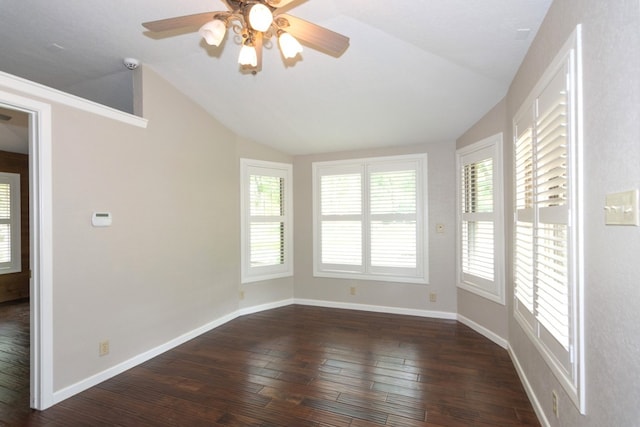 1404 Pearl Cv, Round Rock, TX 78681 - empty room with vaulted ceiling, dark wood-style floors, ceiling fan, and a smoke detector