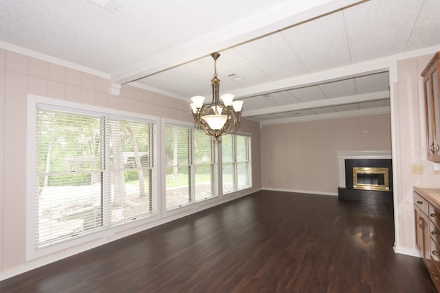 1404 Pearl Cv, Round Rock, TX 78681 - unfurnished dining area with beamed ceiling, dark wood-style flooring, healthy amount of natural light, a chandelier, and a glass covered fireplace