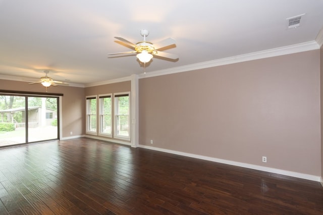 1404 Pearl Cv, Round Rock, TX 78681 - spare room with ceiling fan, crown molding, and dark wood finished floors