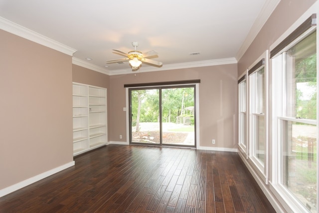 1404 Pearl Cv, Round Rock, TX 78681 - empty room featuring a ceiling fan, dark wood finished floors, and crown molding