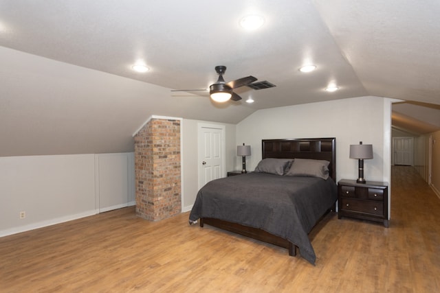 1404 Pearl Cv, Round Rock, TX 78681 - bedroom with vaulted ceiling, wood finished floors, recessed lighting, and a ceiling fan