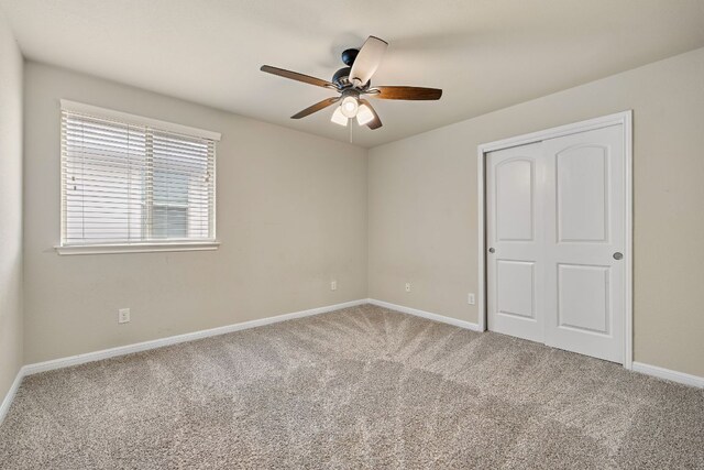605 Joppa Rd, Leander, TX 78641 - unfurnished bedroom featuring carpet floors, a closet, and ceiling fan