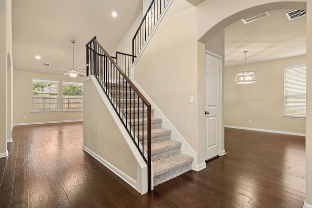 605 Joppa Rd, Leander, TX 78641 - stairway featuring arched walkways, ceiling fan, hardwood / wood-style flooring, and recessed lighting