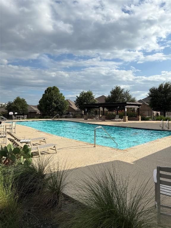 605 Joppa Rd, Leander, TX 78641 - community pool featuring a patio area