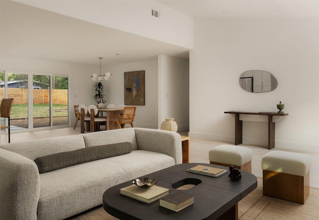 1206 Cloverleaf Dr, Austin, TX 78723 - living room featuring baseboards and a chandelier