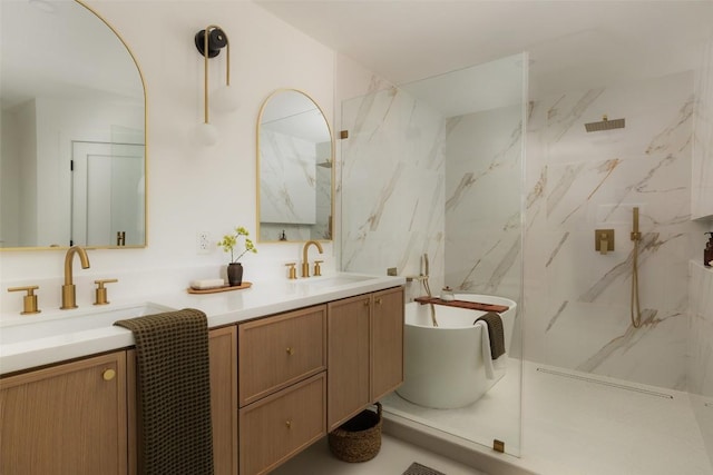 1206 Cloverleaf Dr, Austin, TX 78723 - bathroom featuring double vanity, a marble finish shower, and a freestanding tub