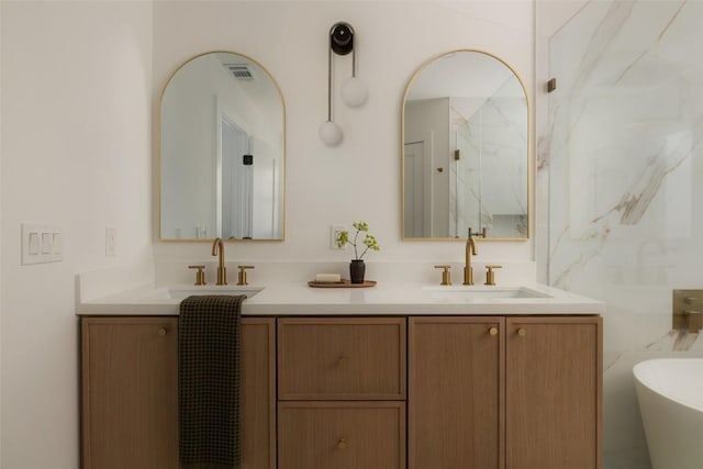 1206 Cloverleaf Dr, Austin, TX 78723 - bathroom with double vanity and a freestanding tub