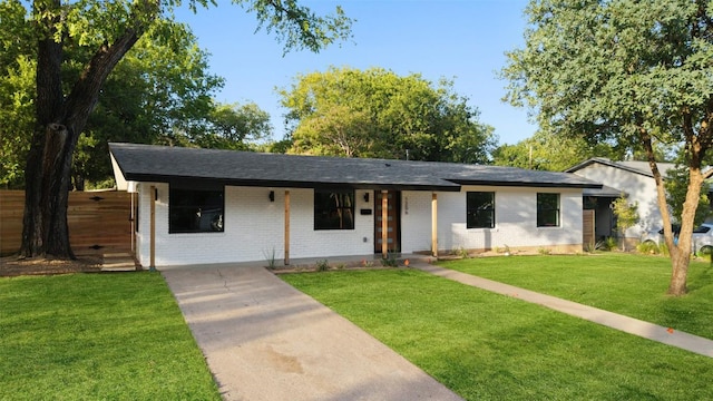 1206 Cloverleaf Dr, Austin, TX 78723 - ranch-style house with brick siding and roof with shingles