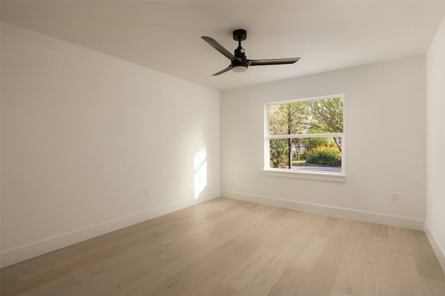 1206 Cloverleaf Dr, Austin, TX 78723 - empty room featuring light wood-style flooring and a ceiling fan