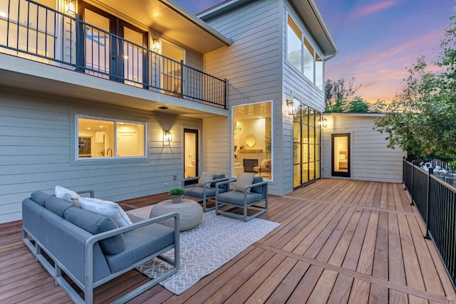3104 Mistyglen Cir, Austin, TX 78746 - deck at dusk with outdoor lounge area
