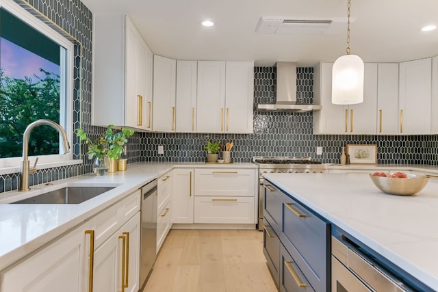 3104 Mistyglen Cir, Austin, TX 78746 - kitchen with wall chimney exhaust hood, stainless steel appliances, white cabinetry, and recessed lighting