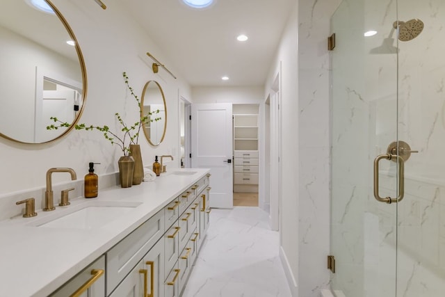 3104 Mistyglen Cir, Austin, TX 78746 - full bath with a marble finish shower, recessed lighting, double vanity, marble finish floors, and a spacious closet