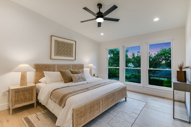 3104 Mistyglen Cir, Austin, TX 78746 - bedroom featuring wood finished floors, recessed lighting, ceiling fan, and vaulted ceiling