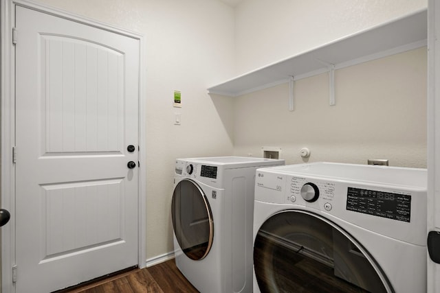 4669 Padula Dr, Round Rock, TX 78665 - laundry area featuring washer and dryer and dark wood-type flooring