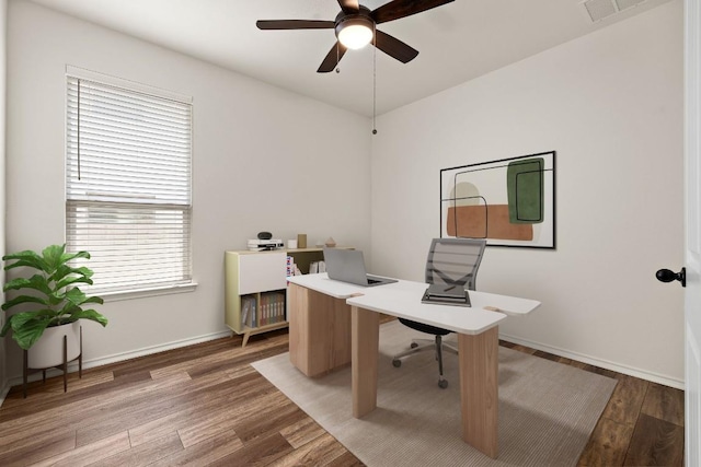 4669 Padula Dr, Round Rock, TX 78665 - home office with a ceiling fan and light wood-type flooring