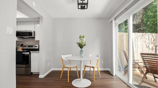 2604 Alcott Ln Unit A & B, Austin, TX 78748 - dining space with dark wood finished floors and baseboards