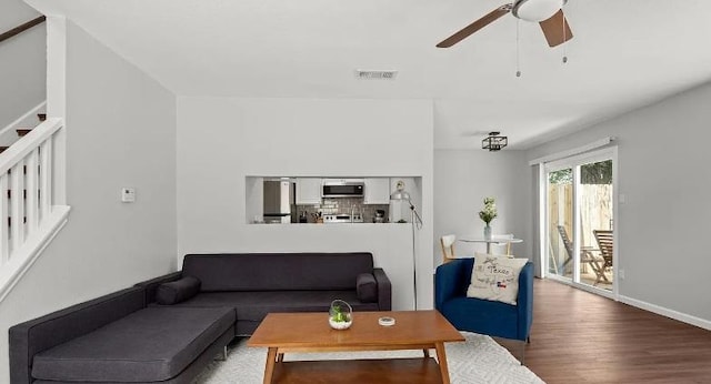 2604 Alcott Ln Unit A & B, Austin, TX 78748 - living area with stairway, ceiling fan, and wood finished floors
