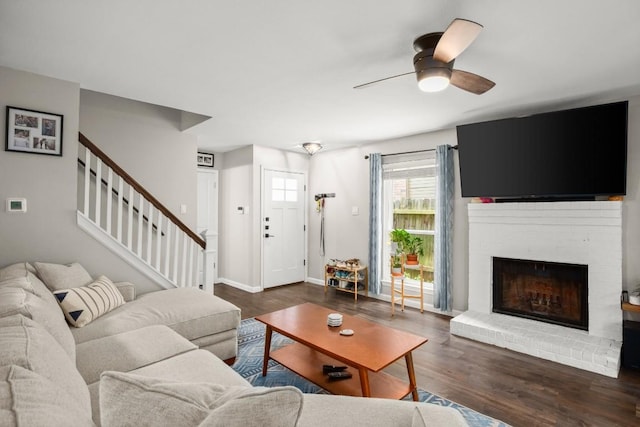 2604 Alcott Ln Unit A & B, Austin, TX 78748 - living room with a ceiling fan, stairs, wood finished floors, and a fireplace