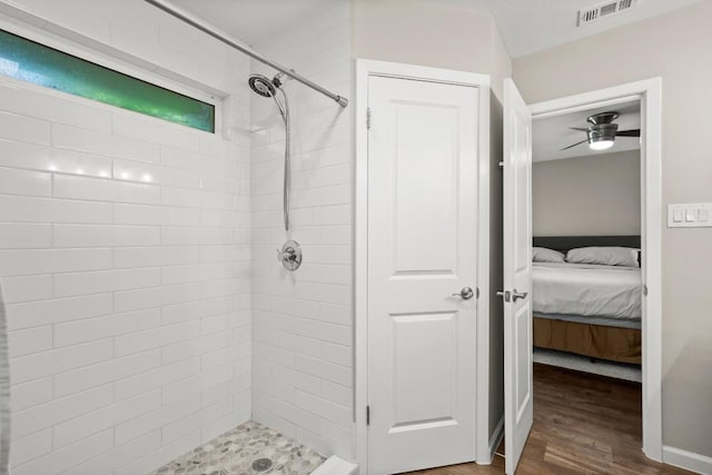 2604 Alcott Ln Unit A & B, Austin, TX 78748 - ensuite bathroom with a tile shower, wood finished floors, and a ceiling fan