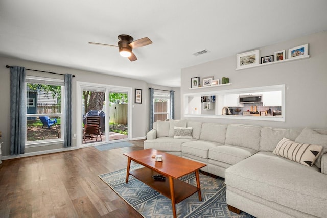 2604 Alcott Ln Unit A & B, Austin, TX 78748 - living area with a ceiling fan, wood finished floors, and plenty of natural light