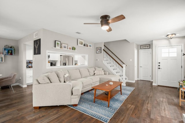 2604 Alcott Ln Unit A & B, Austin, TX 78748 - living area with dark wood-style floors, ceiling fan, and stairway