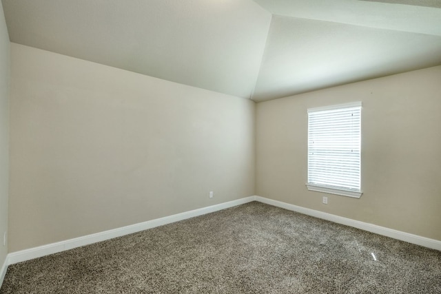 2336 Centennial Loop, Round Rock, TX 78665 - spare room with carpet flooring and lofted ceiling