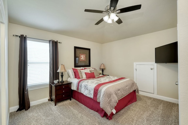 2336 Centennial Loop, Round Rock, TX 78665 - bedroom featuring carpet, multiple windows, and ceiling fan