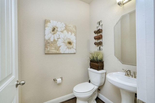 2336 Centennial Loop, Round Rock, TX 78665 - half bathroom with toilet and baseboards