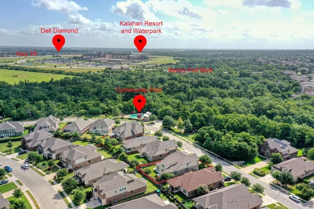 2336 Centennial Loop, Round Rock, TX 78665 - aerial perspective of suburban area with a heavily wooded area