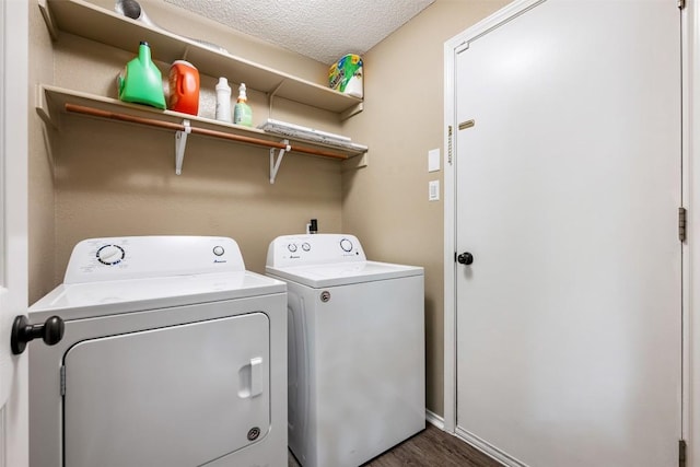 16504 Jadestone Dr, Leander, TX 78641 - washroom featuring washer and dryer, wood finished floors, and a textured ceiling