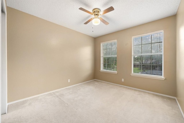 16504 Jadestone Dr, Leander, TX 78641 - unfurnished room featuring a ceiling fan, light colored carpet, and a textured ceiling