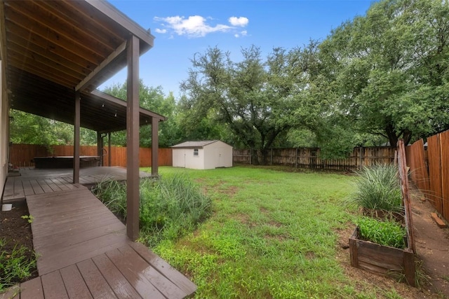16504 Jadestone Dr, Leander, TX 78641 - fenced backyard with a storage unit and a deck