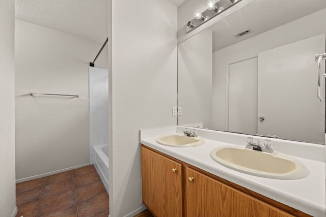 1625 Sylvia Ct, Round Rock, TX 78681 - bathroom with double vanity and bathtub / shower combination