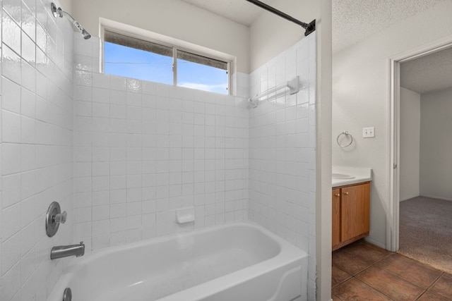 1625 Sylvia Ct, Round Rock, TX 78681 - bathroom with vanity, shower / bathtub combination, tile patterned flooring, and a textured ceiling