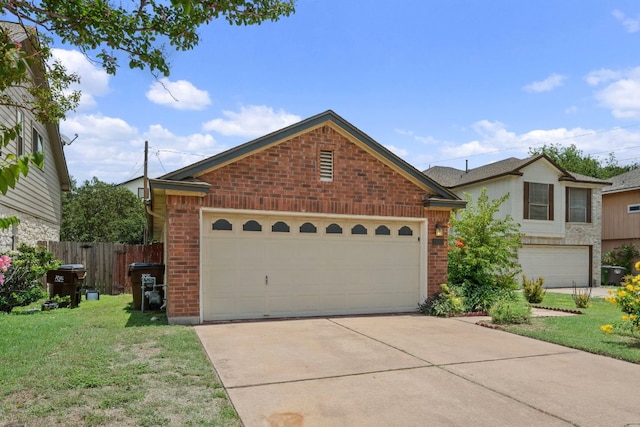 1625 Sylvia Ct, Round Rock, TX 78681 - view of front of house featuring brick siding, a garage, and concrete driveway