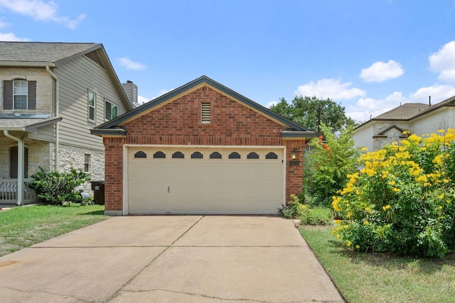 1625 Sylvia Ct, Round Rock, TX 78681 - view of front facade with brick siding, driveway, and a chimney