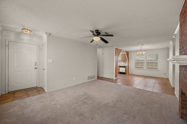 1625 Sylvia Ct, Round Rock, TX 78681 - unfurnished living room with a fireplace, tile patterned flooring, ceiling fan, carpet flooring, and a textured ceiling