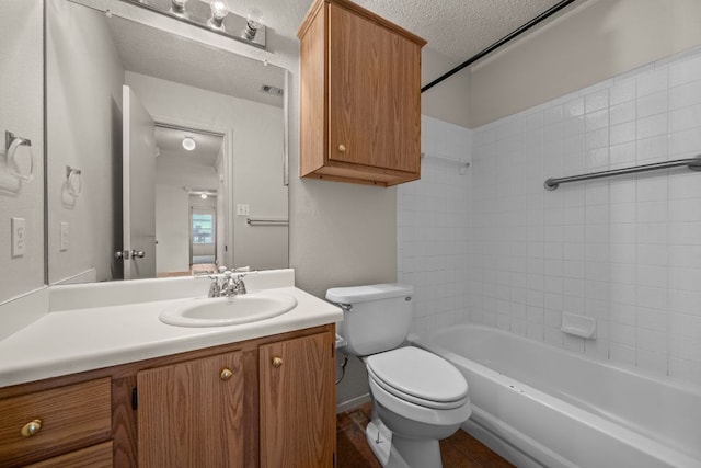 1625 Sylvia Ct, Round Rock, TX 78681 - full bathroom featuring a textured ceiling, vanity, and shower / bathtub combination