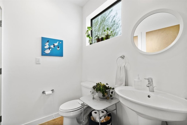 5725 Toscana Ave, Austin, TX 78724 - bathroom with toilet and a sink
