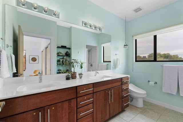 5725 Toscana Ave, Austin, TX 78724 - bathroom with double vanity, a shower with shower door, and tile patterned flooring