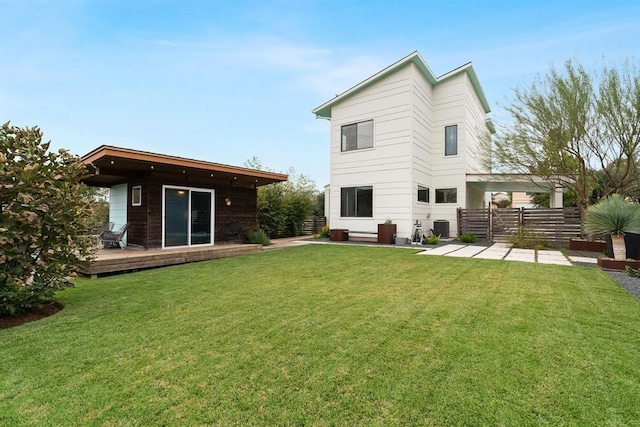 5725 Toscana Ave, Austin, TX 78724 - rear view of property with a wooden deck