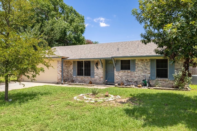 8101 Parkdale Dr, Austin, TX 78757 - ranch-style house with a front yard, concrete driveway, an attached garage, and a shingled roof