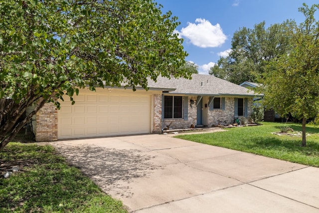 8101 Parkdale Dr, Austin, TX 78757 - view of front facade featuring concrete driveway, an attached garage, and a front lawn
