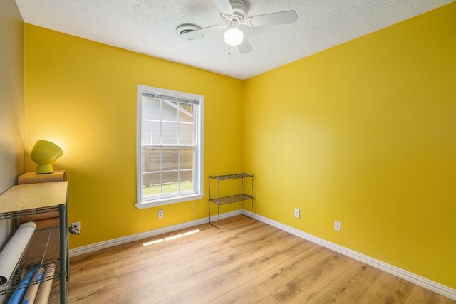 8101 Parkdale Dr, Austin, TX 78757 - spare room with ceiling fan, light wood-style flooring, and a textured ceiling