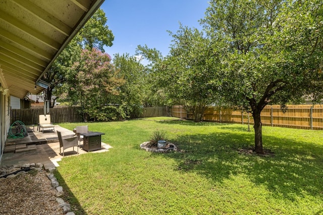 8101 Parkdale Dr, Austin, TX 78757 - fenced backyard with a patio area and a fire pit