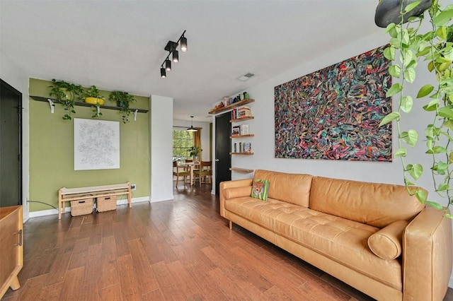 3902 Peterson Ave Unit 203, Austin, TX 78756 - living area with wood finished floors and rail lighting