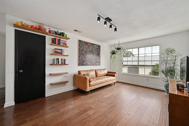 3902 Peterson Ave Unit 203, Austin, TX 78756 - sitting room featuring wood-type flooring and baseboards