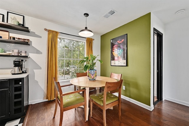3902 Peterson Ave Unit 203, Austin, TX 78756 - dining space with dark wood-style floors and baseboards